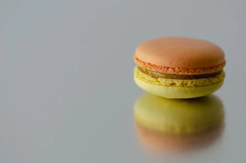Orange-yellow macaroons Stock Photos