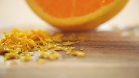 Orange zest on table Video stock 76099484