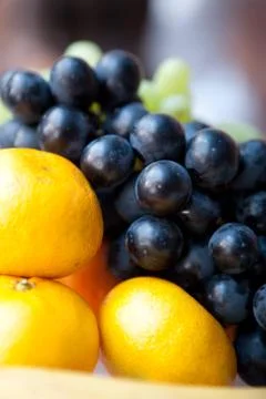 Oranges and grape Stock Photos