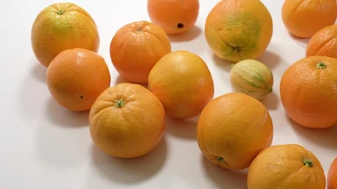 Oranges and lemons close up on white background. Stock Footage 125535201