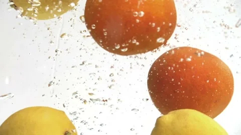 Oranges And Lemons Dropping in Water Stock Footage 239019173