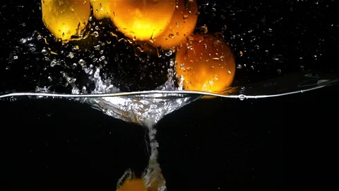 Oranges and Lemons Fall Into Water. Slow motion Video 動画素材 100266593