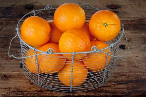 Oranges in a basket Stock Photos
