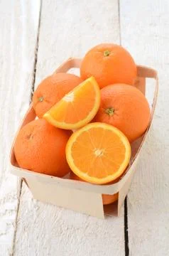 Oranges in the basket Stock Photos