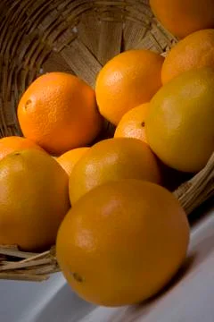 Oranges in a basket Stock Photos