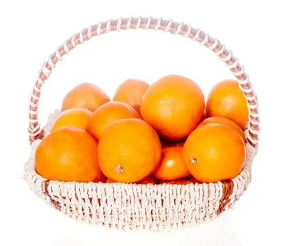 Oranges in basket Stock Photos