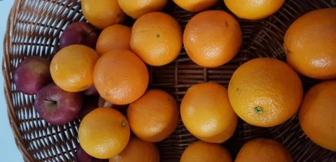 Oranges in a basket Stock Photos