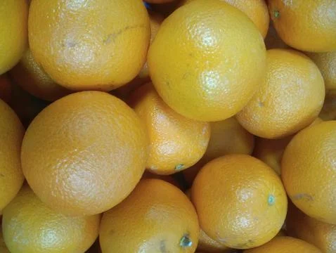 The oranges in the basket Stock Photos