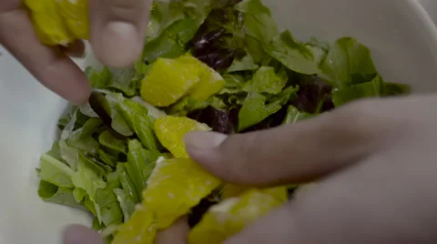 Oranges on a bed of greens Stock Footage 55689818