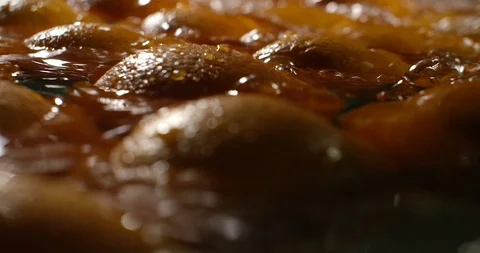 Oranges being washed in a water Stock Footage 96545240