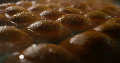 Oranges being washed in a water Stock Footage 96545244