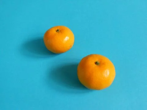 Oranges on blue Stock Photos