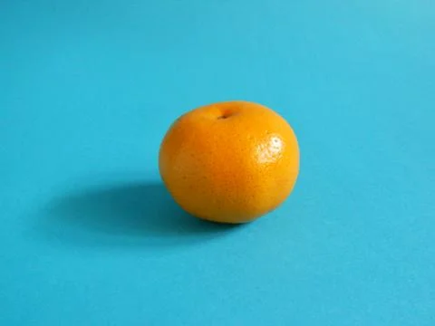 Oranges on blue Stock Photos