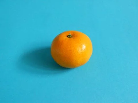 Oranges on blue Stock Photos