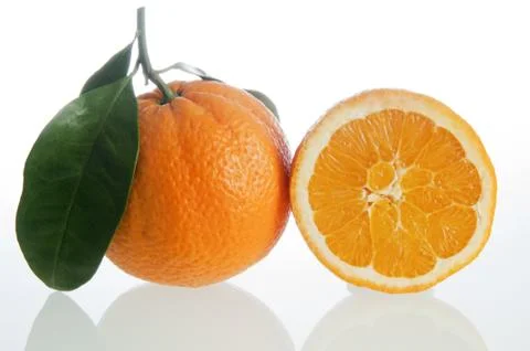Oranges cut in half Stock Photos
