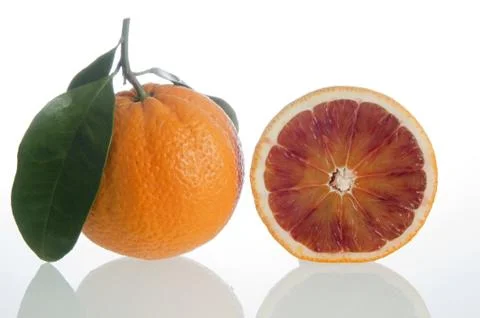 Oranges cut in half Stock Photos