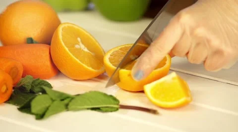 Oranges cut in slow motion Stock Footage 54557594