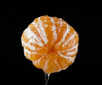 Oranges in drops of water Stock Photos