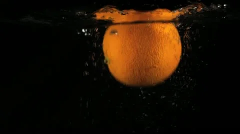 Oranges Falling in Water Stock Footage 11236076