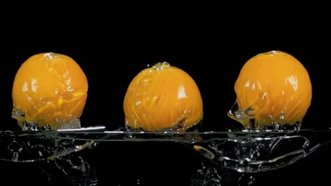 Oranges fly out of the water Video stock 212738409