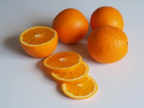 Oranges on a light background Stock Photos