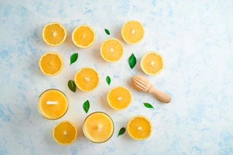 Oranges for making juice, pattern, on a blue background Stock Photos