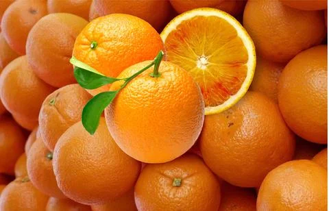Oranges with many vitamins in the foreground Stock Photos