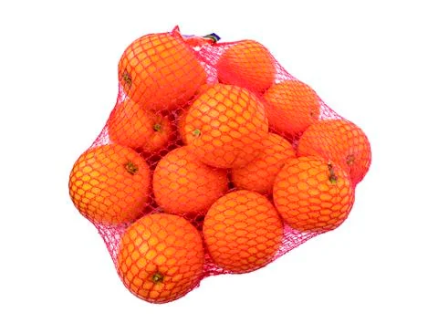 Oranges in net over white background Foto stock