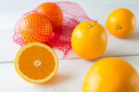 Oranges on the net Stock Photos