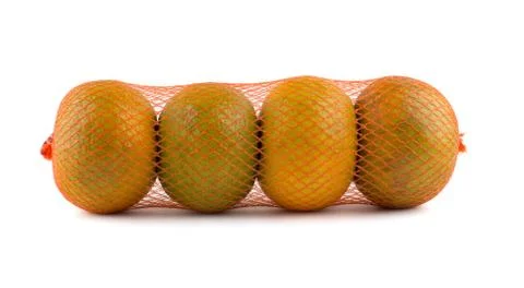 Oranges in net Stock Photos