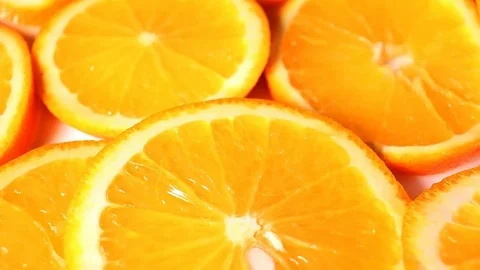 Oranges. Orange slices rotating pattern macro texture background backdrop Video stock 91378054