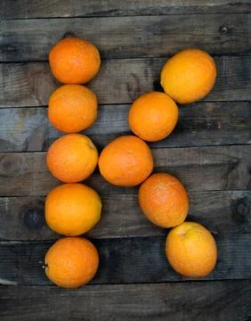 Oranges placed in the shape of a K Stock Photos