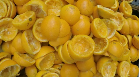 Oranges: pos squeezing -  to make fresh juice Stock Footage 52245219