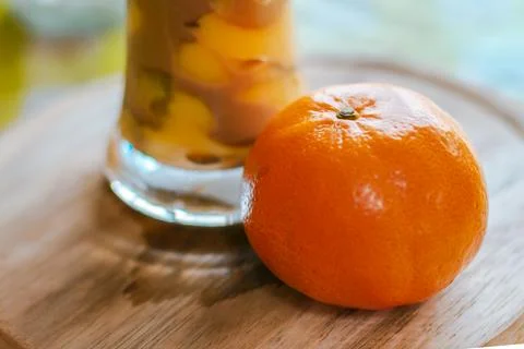 Oranges put on a plate, with a glass of milk. Stock Photos