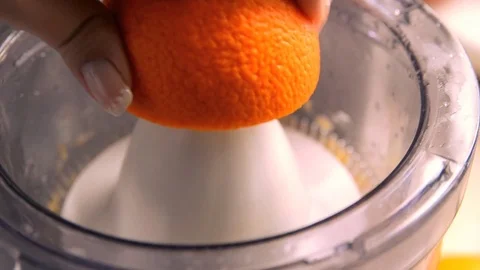Oranges with Reamer juicer Stock Footage 74686316