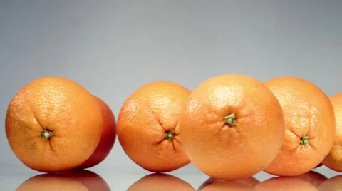 Oranges roll on the table Stock-Footage 48063273