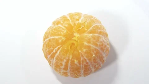 Oranges rotate on the stand 4k bright orange ripe tangerines rotate on their axi Stock Footage 164255851