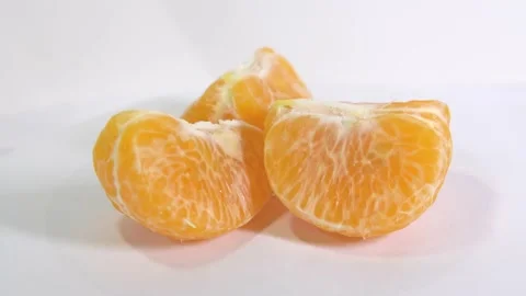 Oranges rotate on the stand 4k bright orange ripe tangerines rotate on their axi Stock Footage 164255976