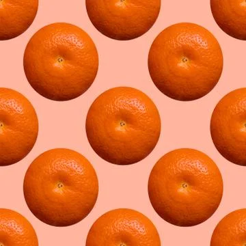 Oranges seamless texture on the pink background. Stock Photos