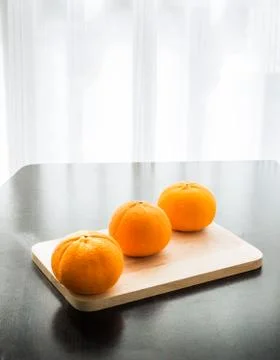 Oranges set on wooden base Stock Photos