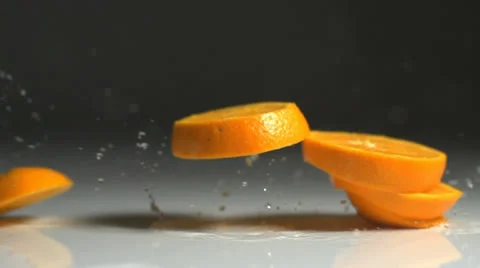 Oranges splashing slow motion Stock Footage 24738095