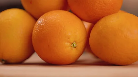 Oranges in a Stack Detail Close Up Tilt Up Video stock 155112815