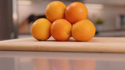 Oranges in a Stack Kitchen Close Up Tilt Up Video stock 155113127