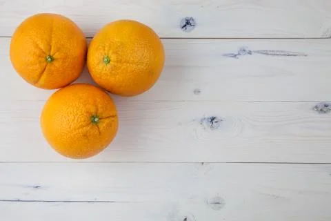 Oranges on table Stock Photos