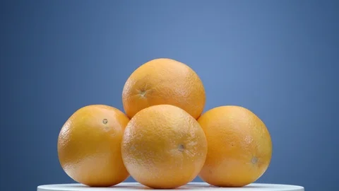 Oranges on the turntable Stock Footage 99364212
