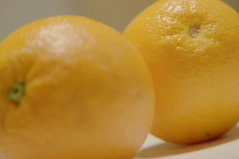 Oranges Two side by side Stock Photos