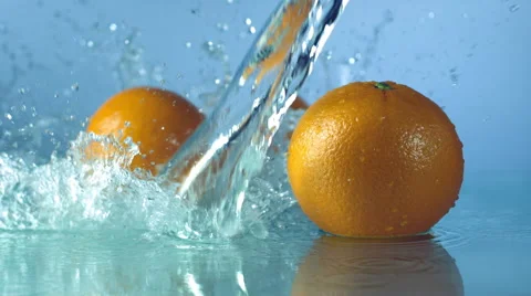 Oranges under running water Stock Footage 48389532