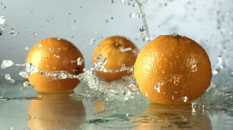Oranges under running water Stock Footage 48392932
