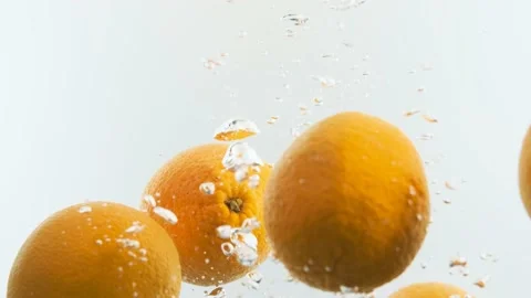 Oranges in the water. Lots of oranges. Stock Footage 142314437