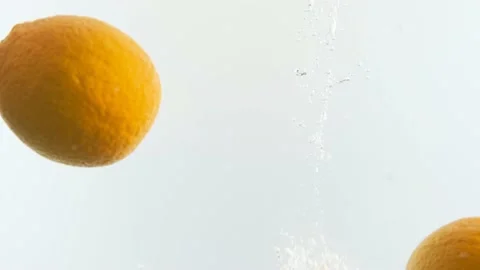 Oranges in the water. Lots of oranges. Stock Footage 142314545